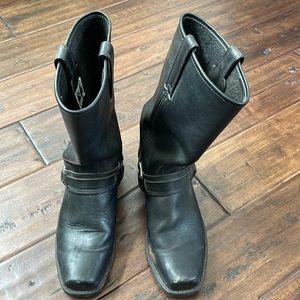 Frye Harness boots.  Run a little big and are a wider width.